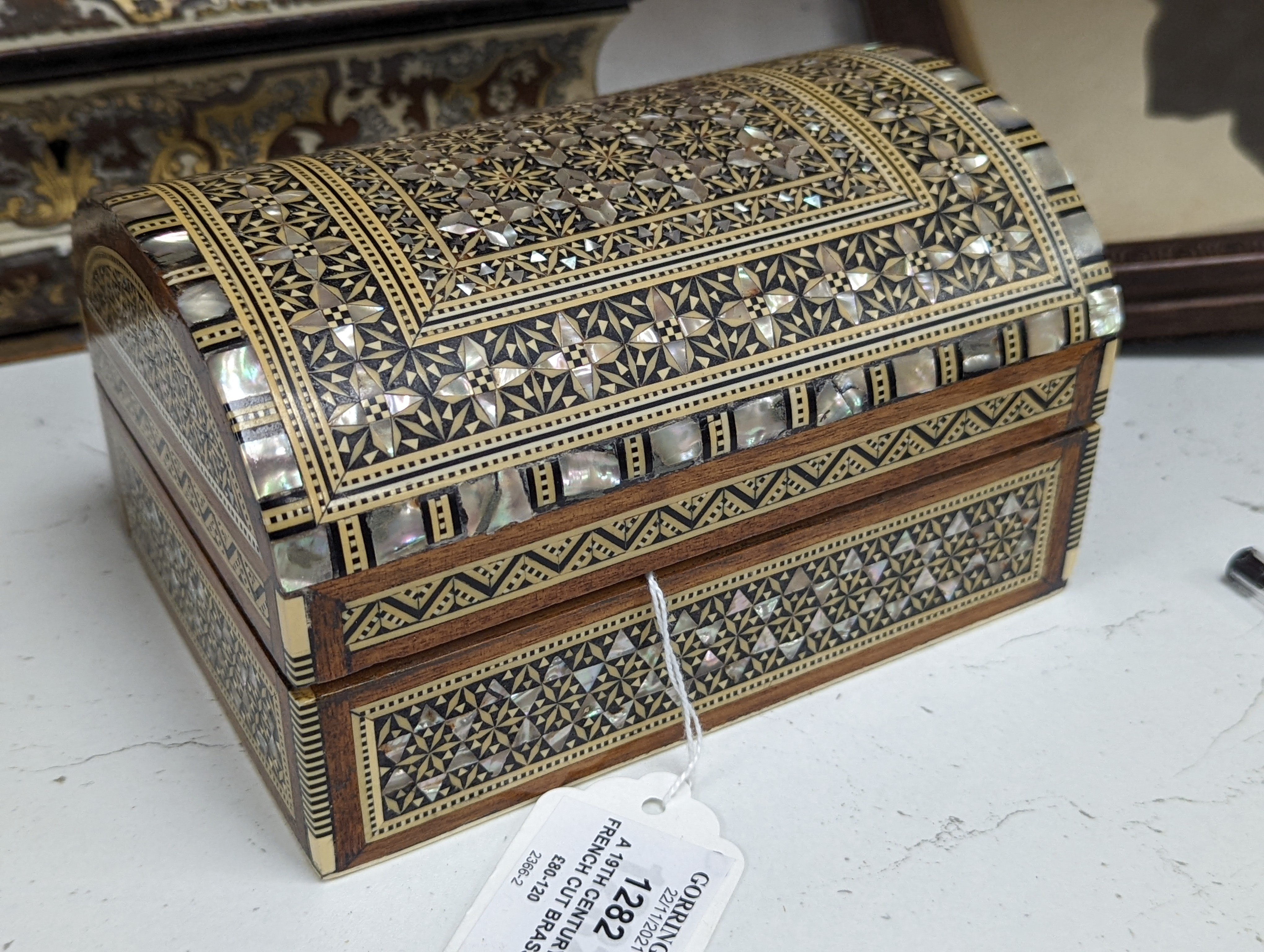 A 19th century French cut brass pewter and ivory inlaid jewellery box, h 10cm, 27 x 19cm, together with a parquetry box (2)